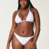 Bas de bikini à bretelles et broderies sur les cuisses