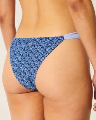 Bas de bikini échancré à bretelles latérales