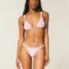 Bas de bikini smocké à coupe haute et échancrée