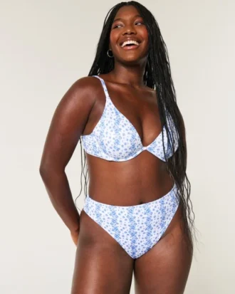 Bas de bikini taille haute à jambes échancrées et cheeks ribbés
