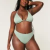 Bas de bikini taille haute à jambes échancrées et cheeks ribbés