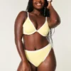 Bas de bikini taille haute à jambes échancrées et cheeks ribbés
