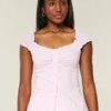 Blouse en popeline à épaules dénudées Blouse en popeline à épaules dénudées