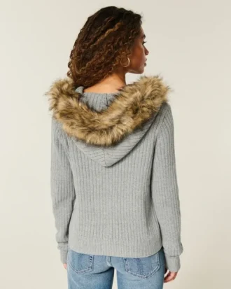 Cardigan à capuche et bordure en fausse fourrure