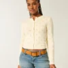Cardigan à œillets Cardigan à œillets