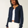 Cardigan à œillets Cardigan à œillets