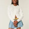 Cardigan à œillets Cardigan à œillets