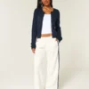 Cardigan à œillets Cardigan à œillets