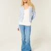 Cardigan à œillets Cardigan à œillets