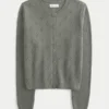 Cardigan à œillets Cardigan à œillets