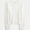 Cardigan à œillets Cardigan à œillets