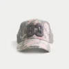 Casquette trucker rose à motif camouflage