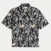 Chemise ample en lin mélangé à motif poissons tropicaux Chemise ample en lin mélangé à motif poissons tropicaux