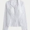 Chemise boutonnée en popeline extensible Chemise boutonnée en popeline extensible