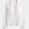 Chemise boutonnée en popeline extensible Chemise boutonnée en popeline extensible