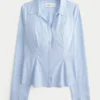 Chemise boutonnée en popeline extensible Chemise boutonnée en popeline extensible