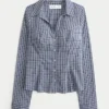 Chemise boutonnée en popeline extensible Chemise boutonnée en popeline extensible