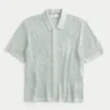 Chemise-pull à manches courtes et coupe carrée Chemise-pull à manches courtes et coupe carrée