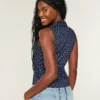 Chemise sans manches boutonnée