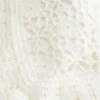 Débardeur à col haut et dos nu en crochet Débardeur à col haut et dos nu en crochet