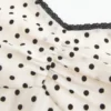 Débardeur en mousseline à bordure en dentelle