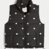 Gilet matelassé à motif cœur Gilet matelassé à motif cœur