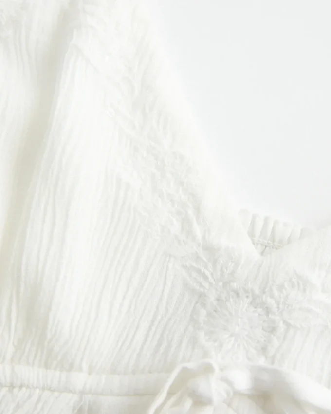 Haut babydoll froissé brillant Haut babydoll froissé brillant