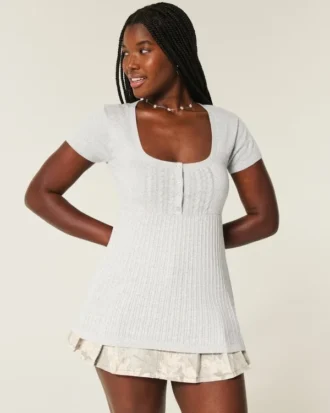 Haut babydoll à manches courtes et col Henley