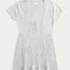 Haut babydoll à manches courtes et col Henley Haut babydoll à manches courtes et col Henley