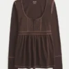 Haut babydoll à manches longues et col Henley Haut babydoll à manches longues et col Henley