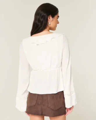 Haut babydoll à manches longues et volants