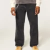 Hollister x Taco Bell Jean baggy noir délavé avec broderies graphiques Hollister x Taco Bell Jean baggy noir délavé avec broderies graphiques