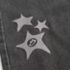 Jean baggy délavé noir avec motif étoile