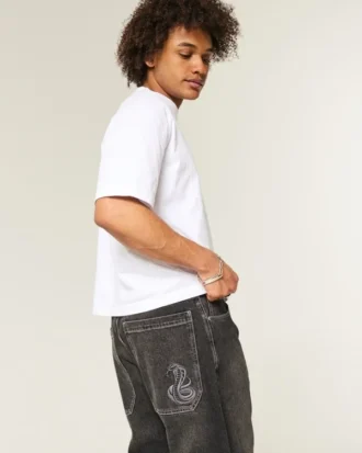 Jean baggy noir délavé avec broderie serpent