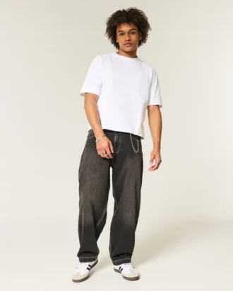 Jean baggy noir délavé avec broderie serpent