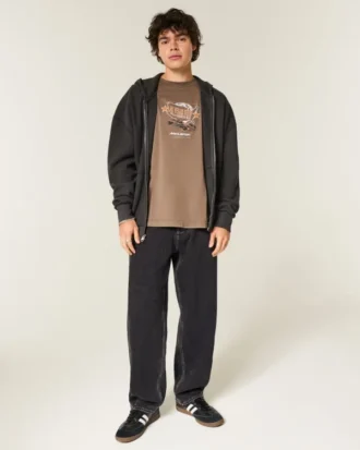 Jean baggy noir délavé à coutures apparentes