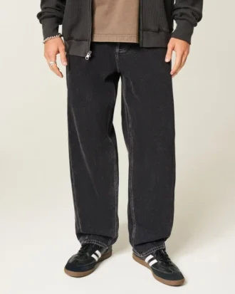 Jean baggy noir délavé à coutures apparentes