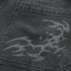 Jean baggy noir délavé à motif graphique Jean baggy noir délavé à motif graphique