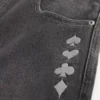 Jean baggy noir délavé à motif joker de jeu de cartes Jean baggy noir délavé à motif joker de jeu de cartes