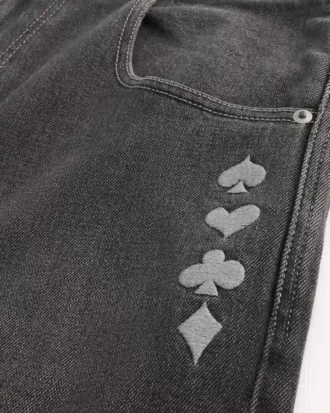 Jean baggy noir délavé à motif joker de jeu de cartes