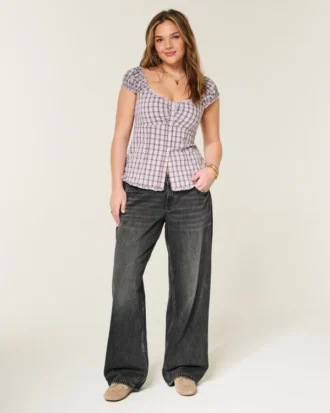Jean baggy noir délavé à taille basse et ajustable