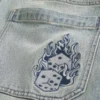 Jean baggy skater délavé clair avec broderie en forme de dés