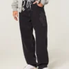 Jean baggy skater délavé noir avec motif dragon Jean baggy skater délavé noir avec motif dragon