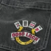 Jean baggy skater noir délavé avec broderie Good Luck Jean baggy skater noir délavé avec broderie Good Luck