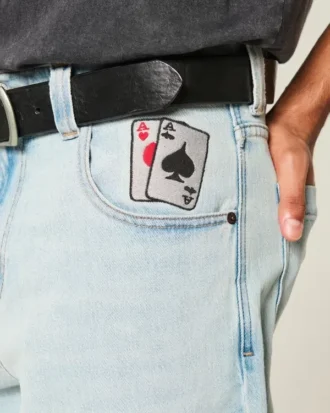 Jean baggy skateur délavé clair avec motif cartes à jouer