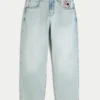 Jean baggy skateur délavé clair avec motif cartes à jouer Jean baggy skateur délavé clair avec motif cartes à jouer