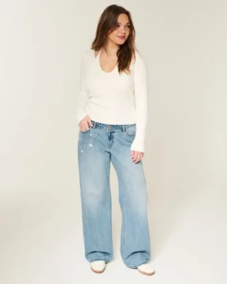 Jean baggy taille basse délavé clair avec broderies en chaîne