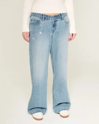 Jean baggy taille basse délavé clair avec broderies en chaîne