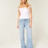 Jean baggy taille basse délavé clair à nœuds cloutés Jean baggy taille basse délavé clair à nœuds cloutés