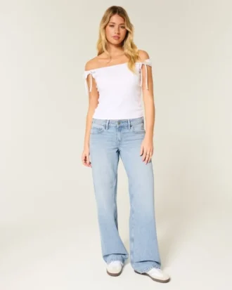 Jean baggy taille basse délavé clair à nœuds cloutés Jean baggy taille basse délavé clair à nœuds cloutés